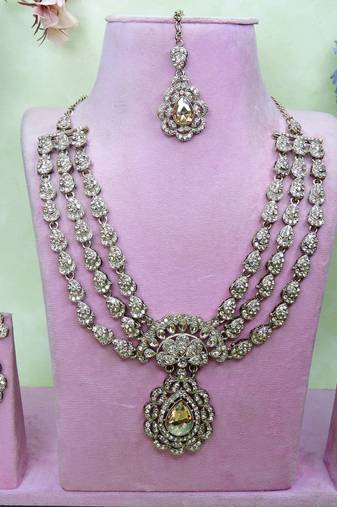 Gold yellow gold premium designer american diamond and stone work necklace set