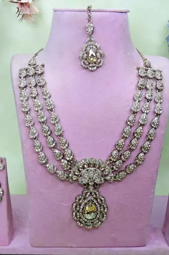 Gold yellow gold premium designer american diamond and stone work necklace set