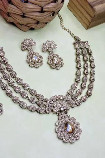 Gold yellow gold premium designer american diamond and stone work necklace set