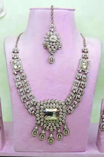 Gold yellow gold premium designer american diamond and stone work necklace set