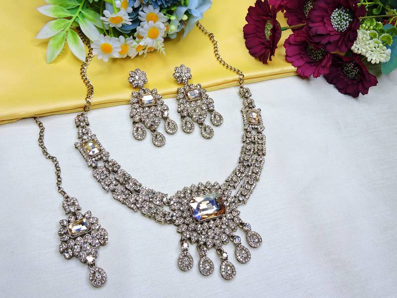 Gold yellow gold premium designer american diamond and stone work necklace set