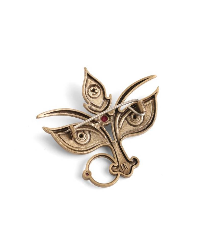 Antique gold brass divine eyes brooch