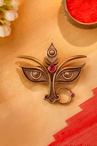 Antique gold brass divine eyes brooch