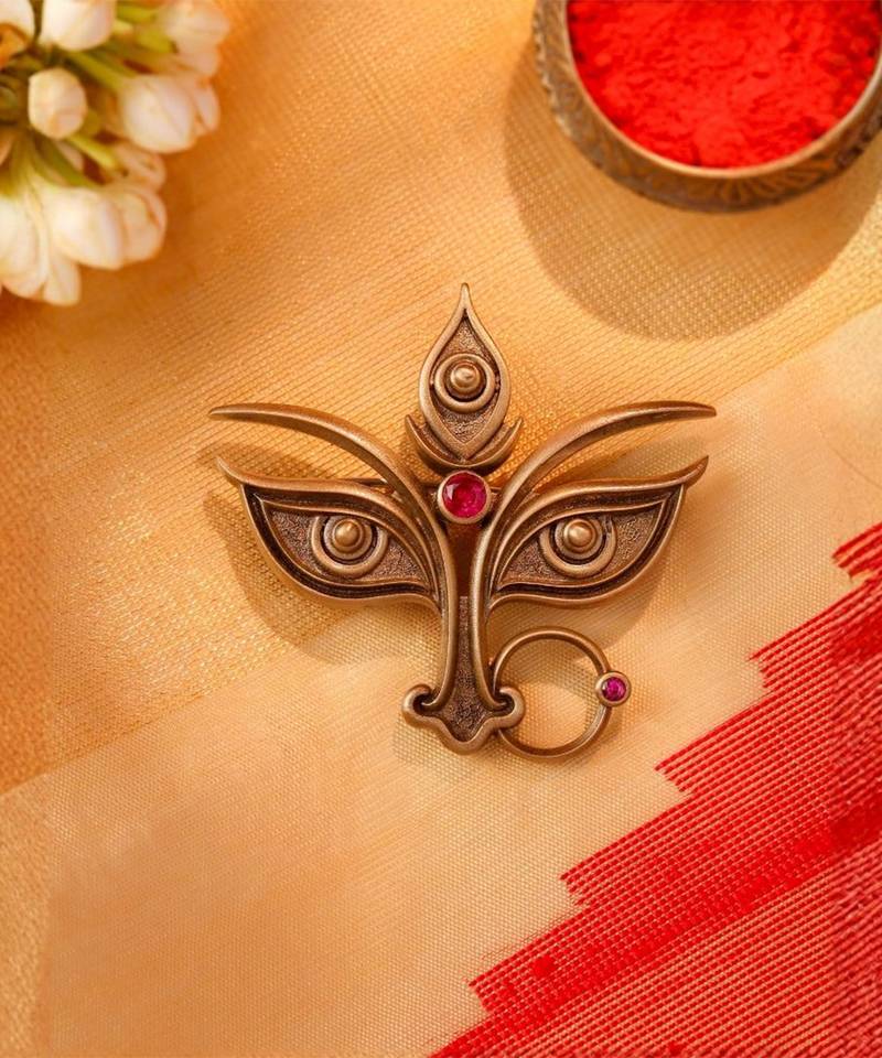 Antique gold brass divine eyes brooch