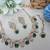Green yellow gold premium designer american diamond and stone work necklace set