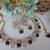 Maroon yellow gold premium designer american diamond and stone work necklace set