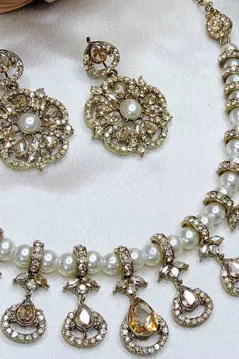 Gold yellow gold premium designer american diamond and stone work necklace set