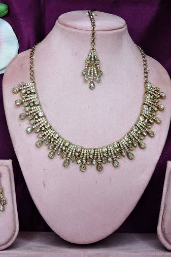 Gold yellow gold premium designer american diamond and stone work necklace set
