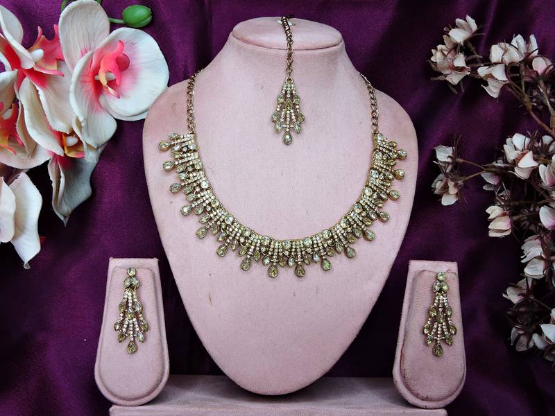 Gold yellow gold premium designer american diamond and stone work necklace set