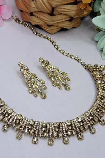 Gold yellow gold premium designer american diamond and stone work necklace set