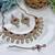 Pink yellow gold premium designer american diamond and stone work necklace set