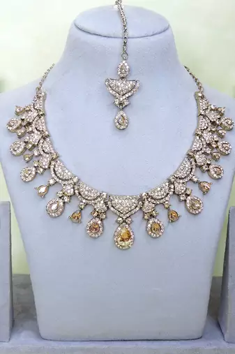 Gold yellow gold premium designer american diamond and stone work necklace set