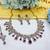 Purple yellow gold premium designer american diamond and stone work necklace set