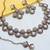 Purple yellow gold premium designer american diamond and stone work necklace set