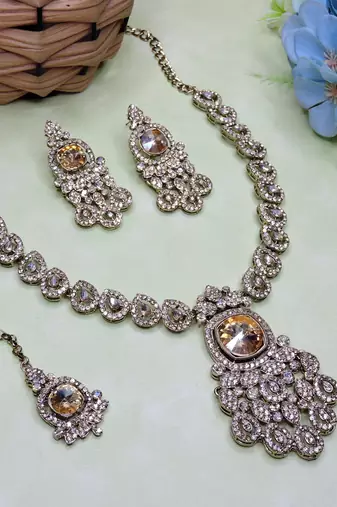 Gold yellow gold premium designer american diamond and stone work necklace set