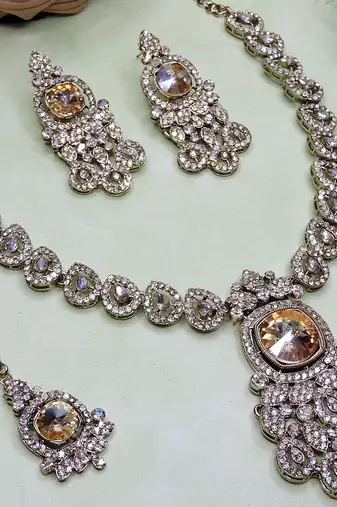Gold yellow gold premium designer american diamond and stone work necklace set