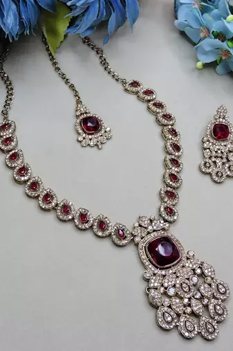 Maroon yellow gold premium designer american diamond and stone work necklace set