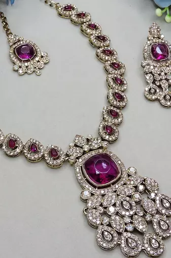 Purple yellow gold premium designer american diamond and stone work necklace set