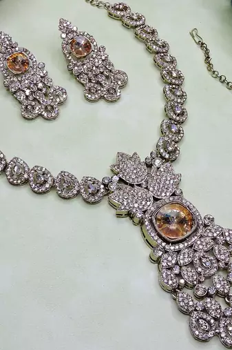 Gold yellow gold premium designer american diamond and stone work necklace set