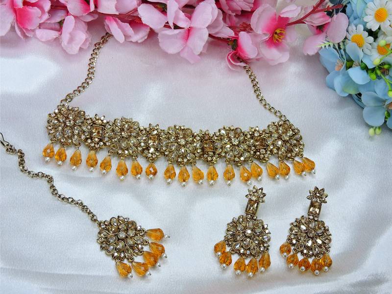 Gold yellow gold premium designer american diamond and stone work necklace set