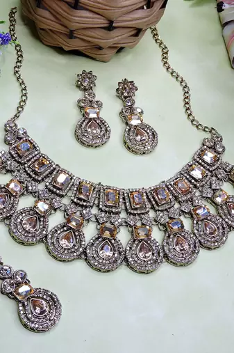 Gold yellow gold premium designer american diamond and stone work necklace set