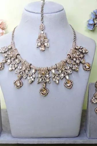 Gold yellow gold premium designer american diamond and stone work necklace set