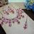 Red rose gold premium designer american diamond and stone work necklace set