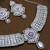 Pink rhodium premium designer american diamond and stone work necklace set