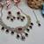 Maroon yellow gold premium designer american diamond and stone work necklace set