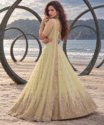 LEMON YELLOW NET BEATS & THREAD EWMBROIDERY WITH SEQUINCE WORK FESTIVE LEHENGA CHOLI SET FOR WOMEN'S 2