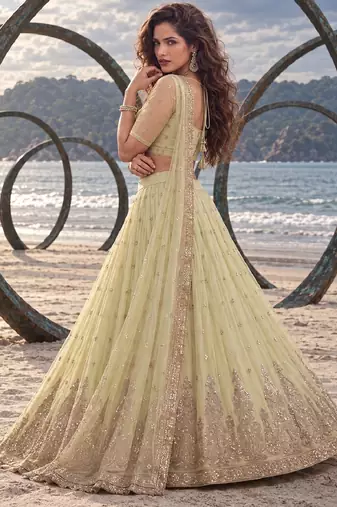 LEMON YELLOW NET BEATS & THREAD EWMBROIDERY WITH SEQUINCE WORK FESTIVE LEHENGA CHOLI SET FOR WOMEN'S