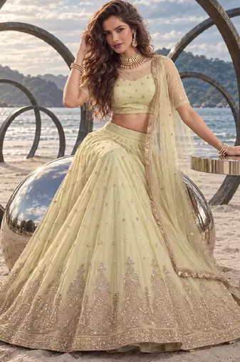 LEMON YELLOW NET BEATS & THREAD EWMBROIDERY WITH SEQUINCE WORK FESTIVE LEHENGA CHOLI SET FOR WOMEN'S