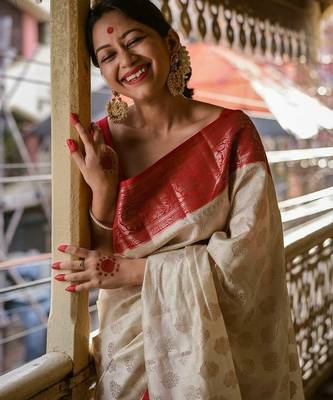 Off white red silk blend jacuard work festival saree with unstitched blouse piece 1