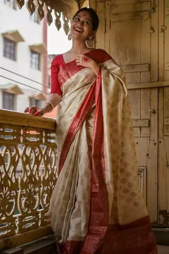 Off white red silk blend jacuard work festival saree with unstitched blouse piece