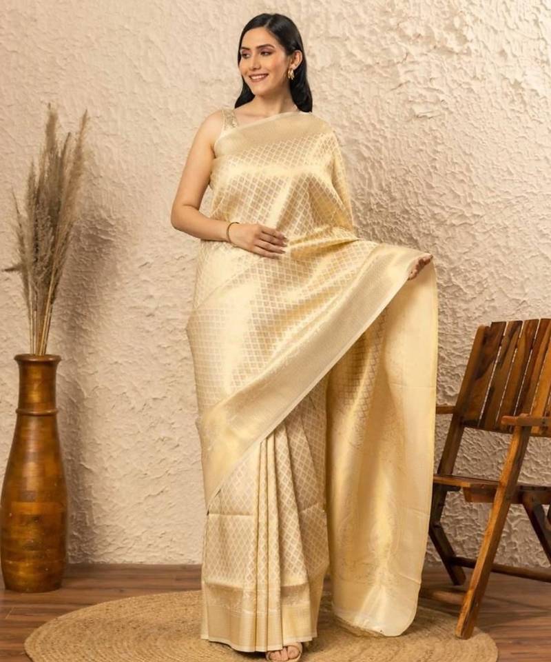 Off white silk blend jacuard work festival saree with unstitched blouse piece