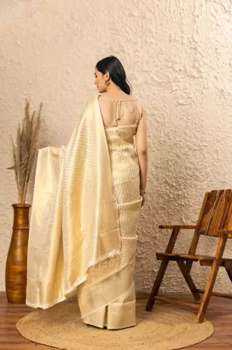 Off white silk blend jacuard work festival saree with unstitched blouse piece