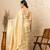 Off white silk blend jacuard work festival saree with unstitched blouse piece
