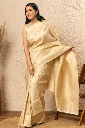 Off white silk blend jacuard work festival saree with unstitched blouse piece