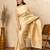 Off white silk blend jacuard work festival saree with unstitched blouse piece