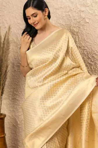 Off white silk blend jacuard work festival saree with unstitched blouse piece