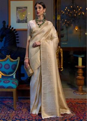 Off white silk blend jacuard work festival saree with unstitched blouse piece 1