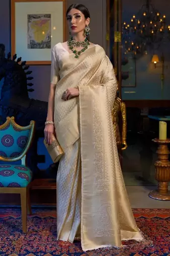 Off white silk blend jacuard work festival saree with unstitched blouse piece