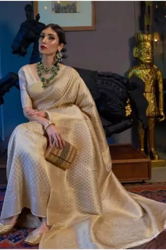 Off white silk blend jacuard work festival saree with unstitched blouse piece