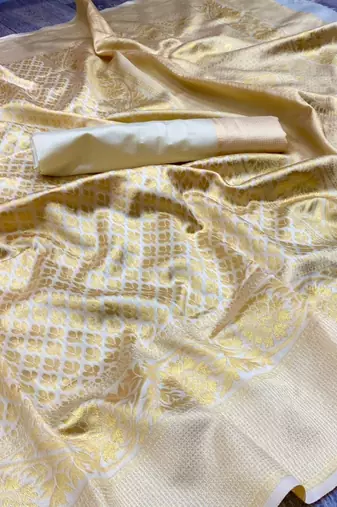 Off white silk blend jacuard work festival saree with unstitched blouse piece