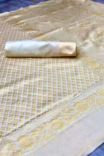 Off white silk blend jacuard work festival saree with unstitched blouse piece