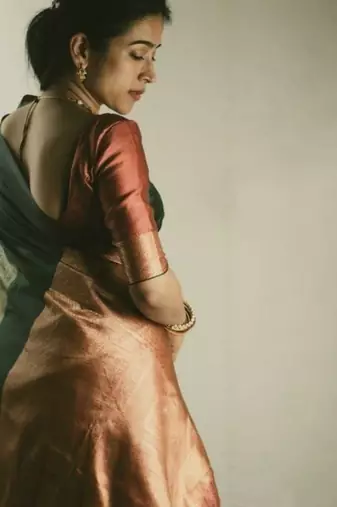 Green red silk blend jacuard work festival saree with unstitched blouse piece
