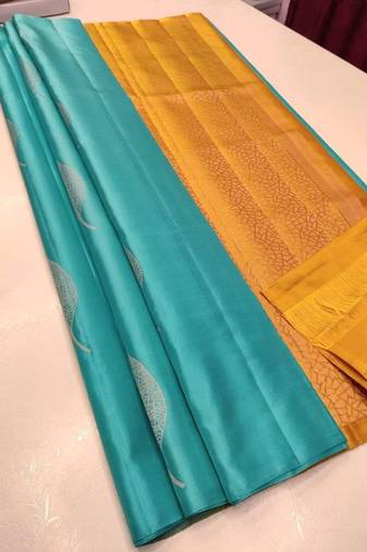 Turquoise yellow silk blend jacuard work festival saree with unstitched blouse piece