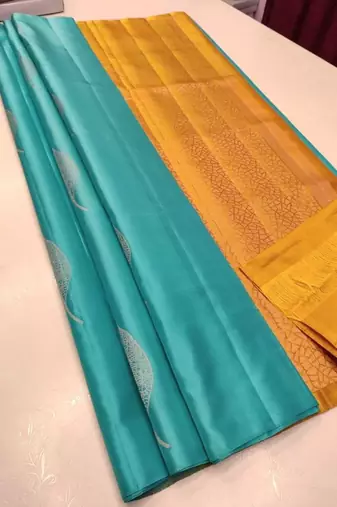 Turquoise yellow silk blend jacuard work festival saree with unstitched blouse piece
