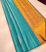 Turquoise yellow silk blend jacuard work festival saree with unstitched blouse piece