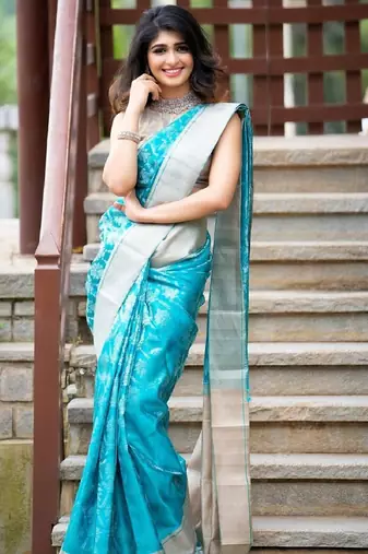 Turquoise silk blend jacuard work festival saree with unstitched blouse piece